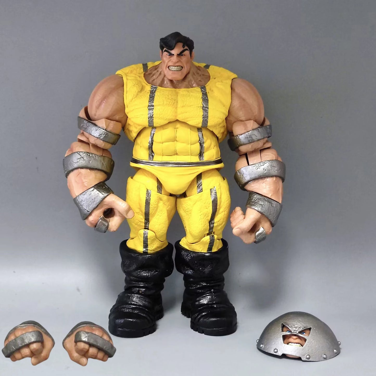 Figurka Wolverine Prison Weapon X — żółty kombinezon, siekiera i kajdanki, 9 cali